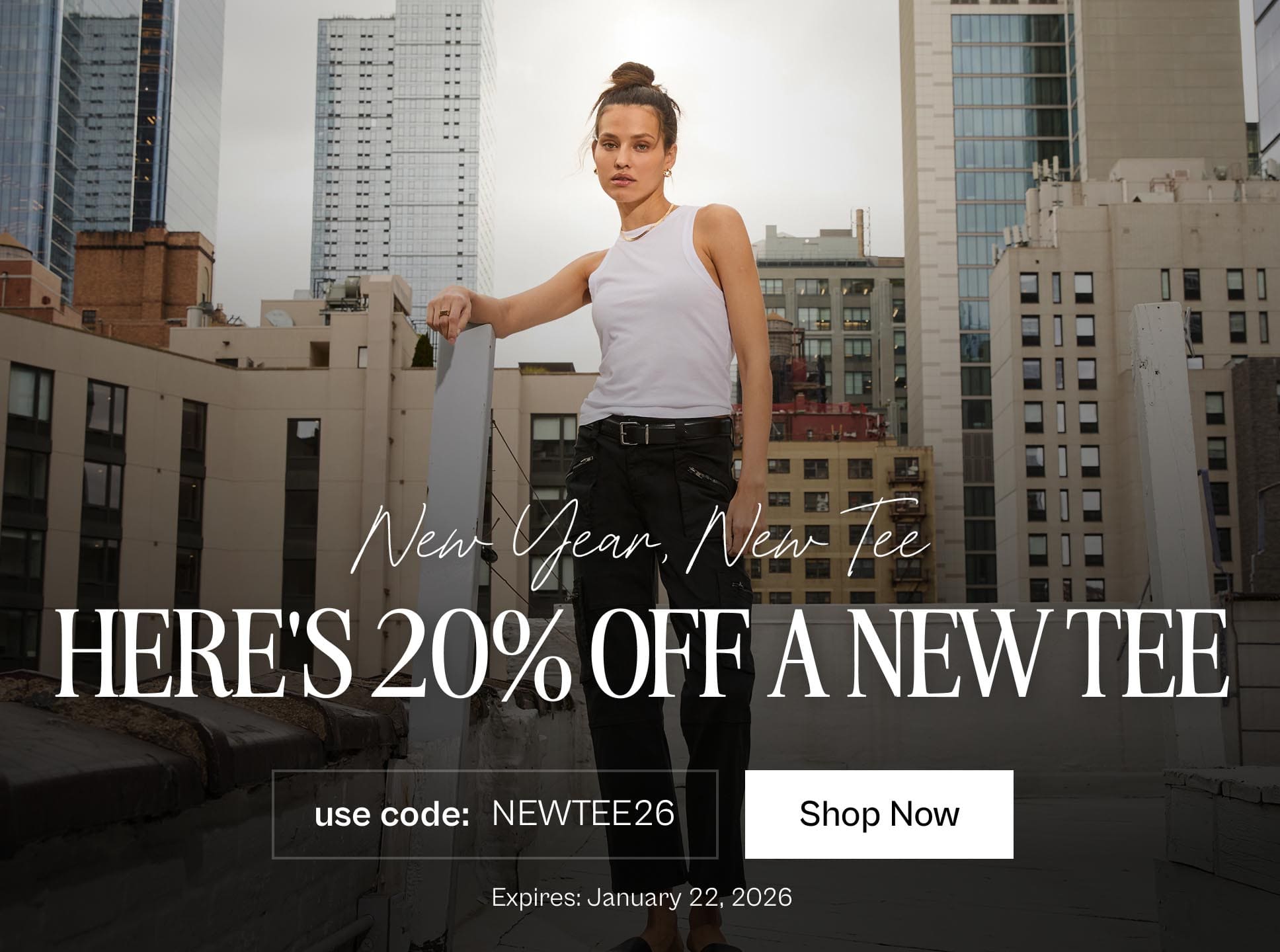 Model standing next to Sky Scrapers