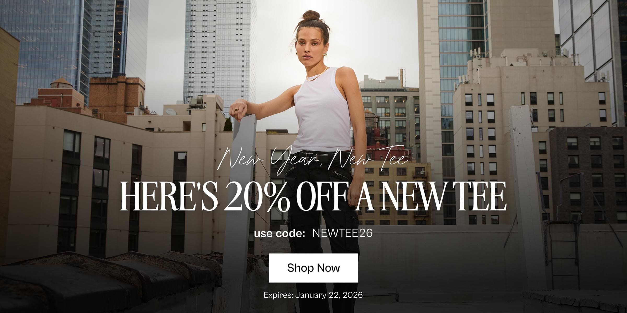 Model standing next to Sky Scrapers